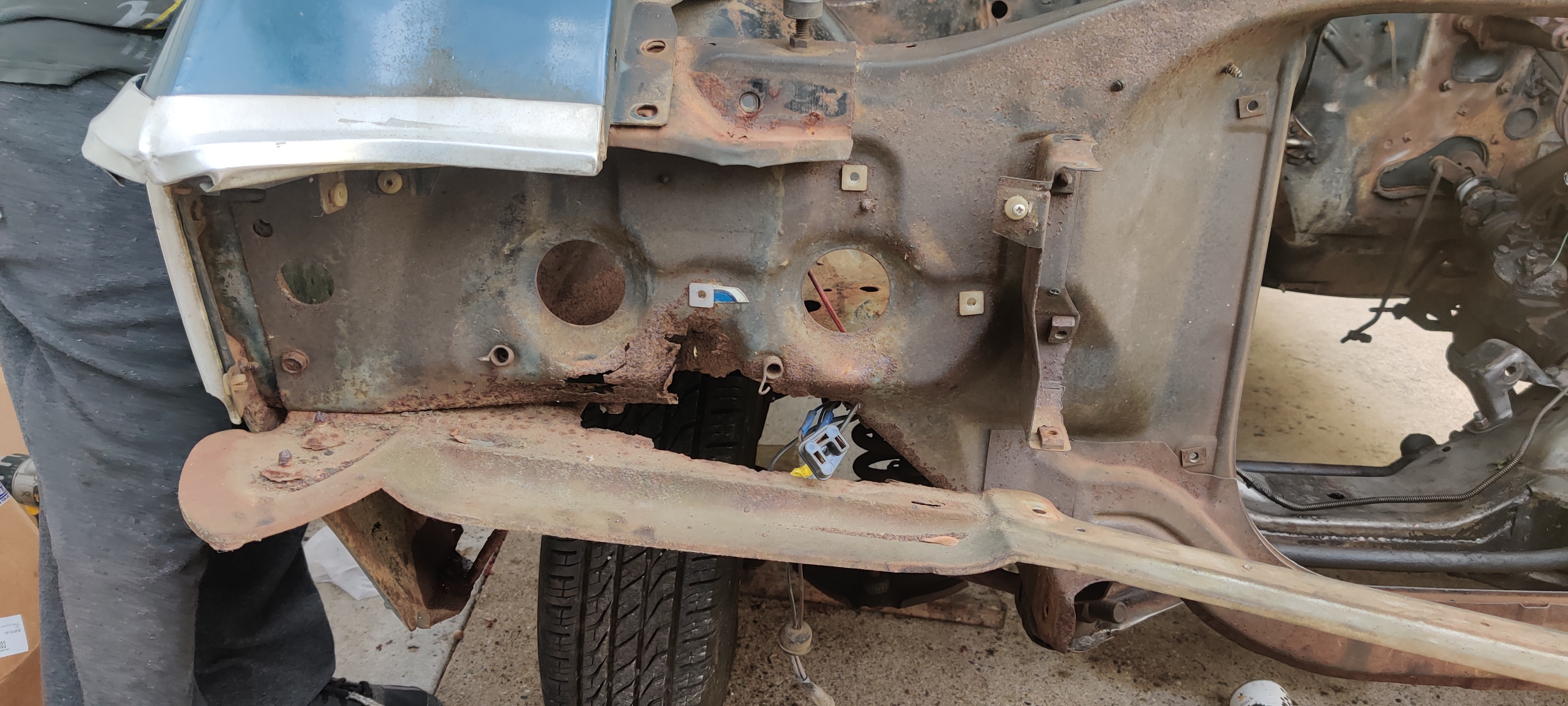 Front right, lot of rotted metal